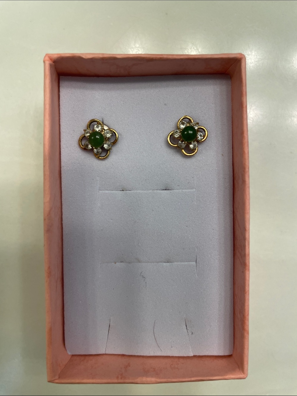 Gold Floral Stud Earrings with Green Gemstones